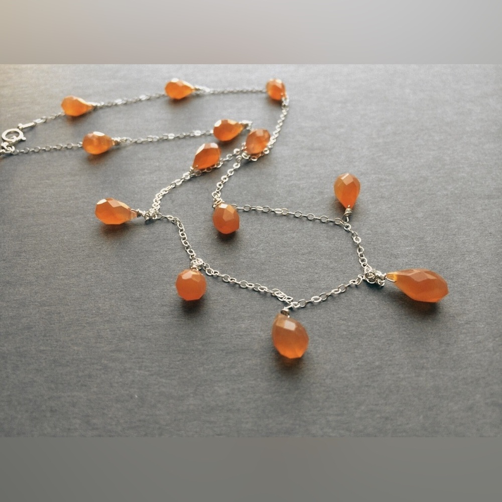 Elegant Silver Necklace with Orange Accents